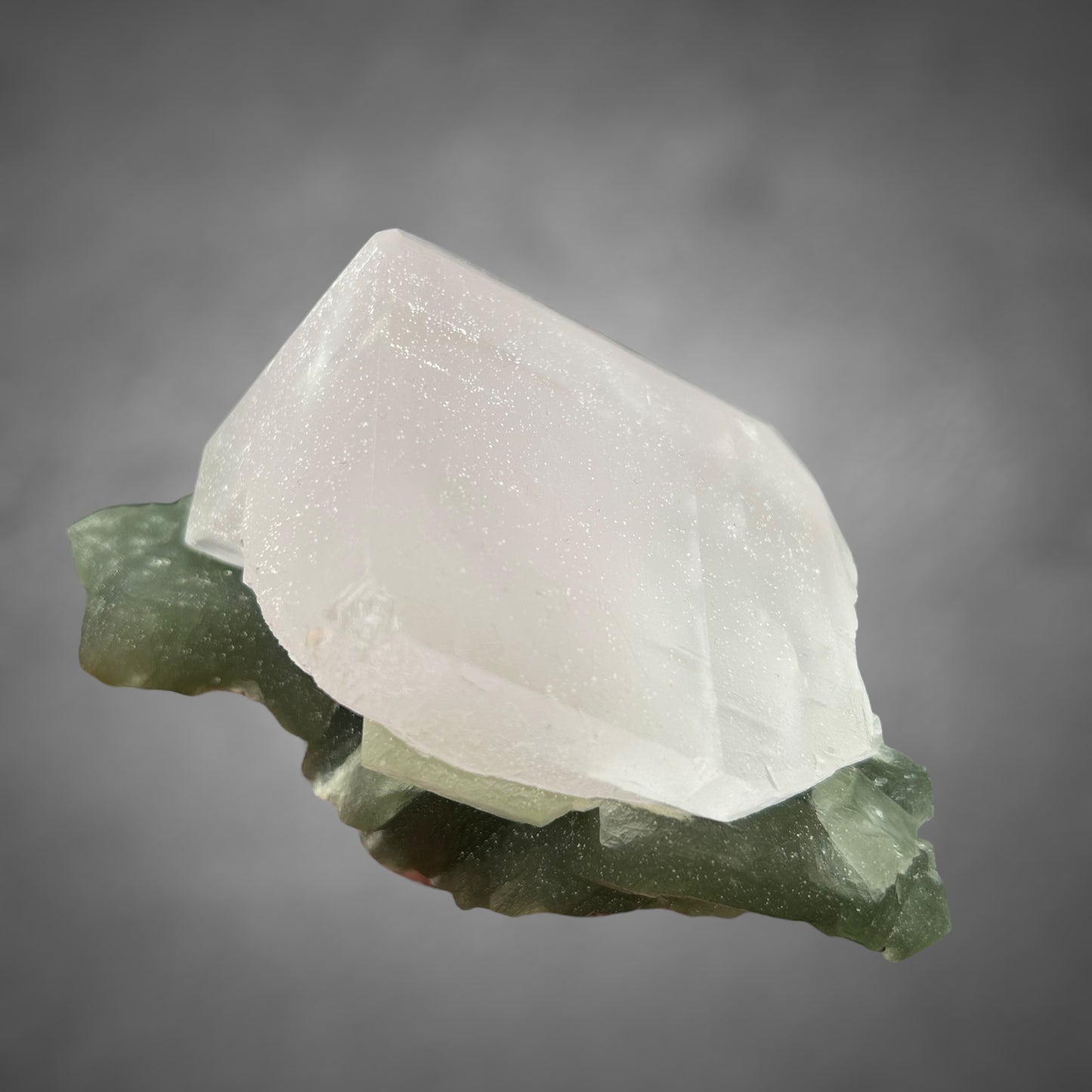 Pink on green Calcite (UV!) - Naica, Mexico