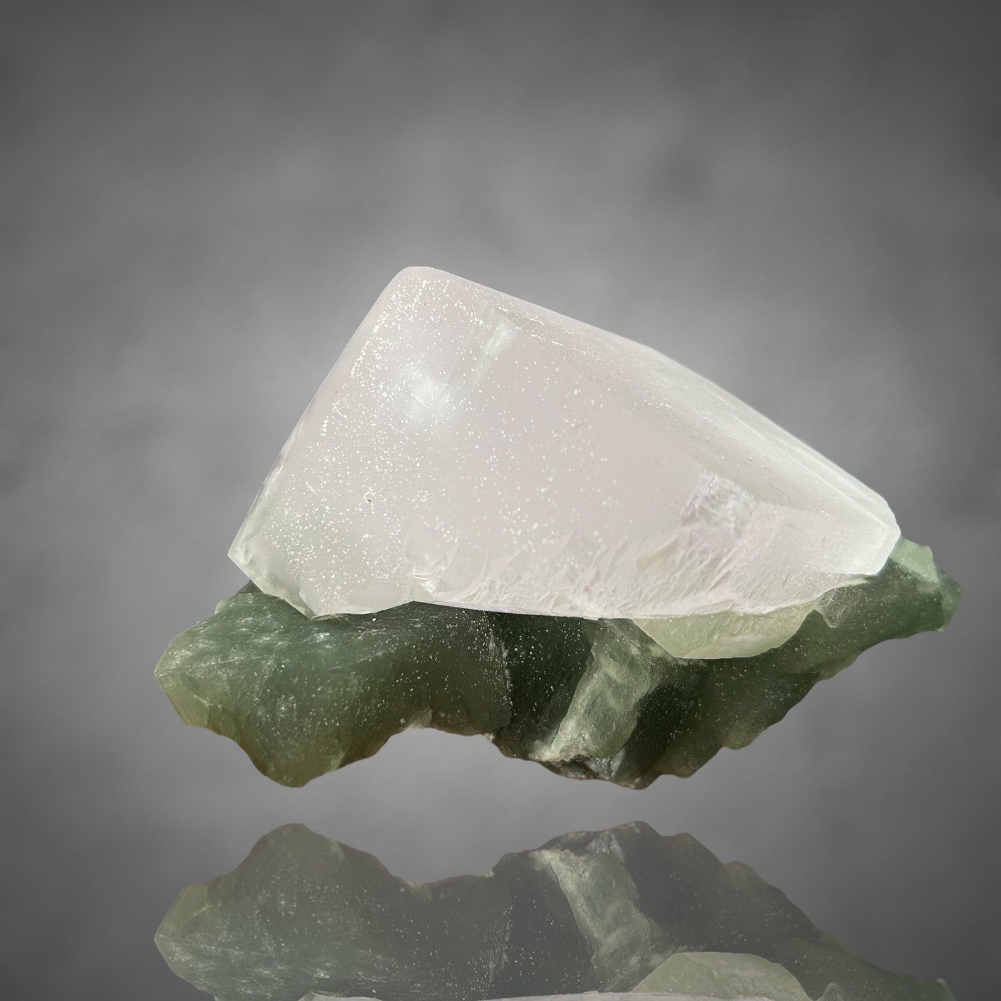 Pink on green Calcite (UV!) - Naica, Mexico